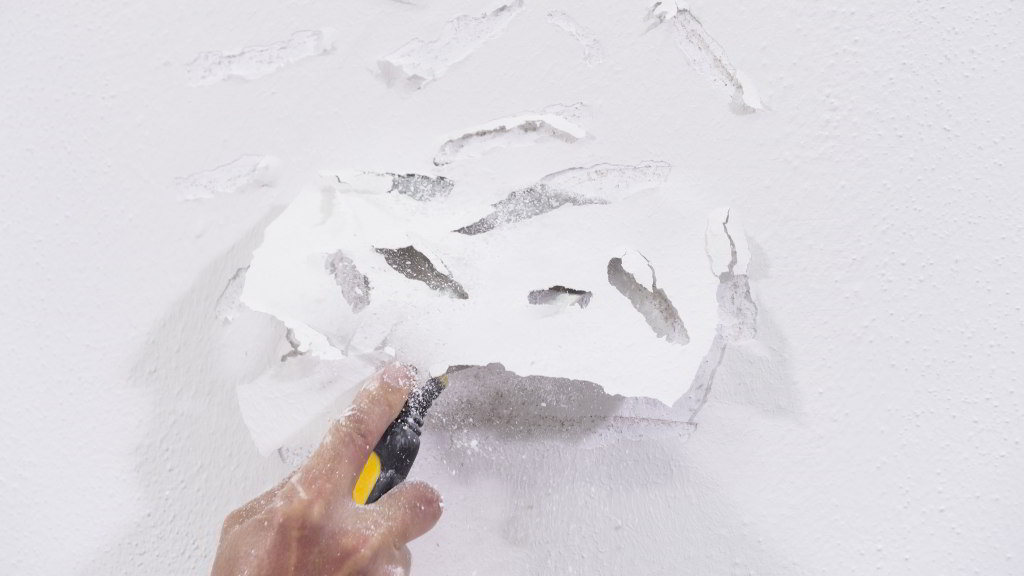 Odlupujúci sa náter na fasáde